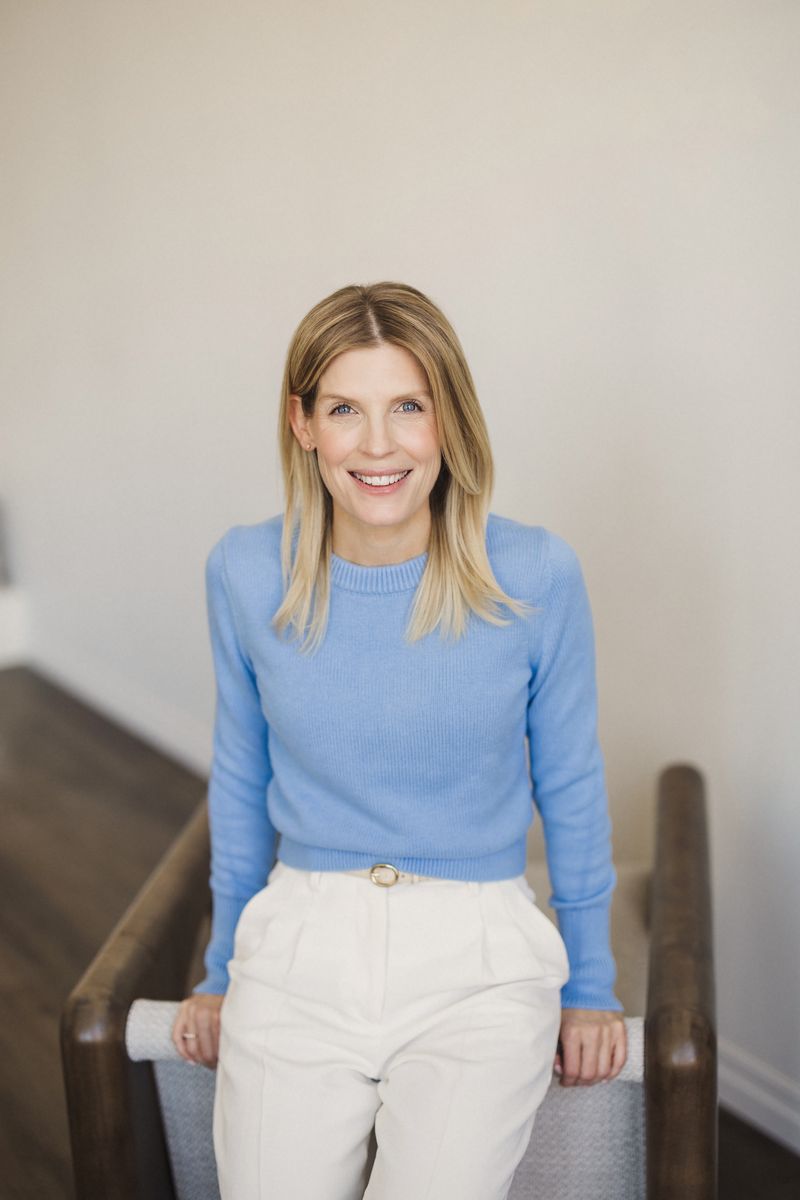 Dr. Say Kerner, smiling, in a blue sweater